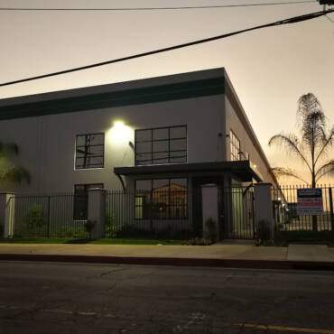 Night view of industrial building front of Club Spec Garage Car Storage
