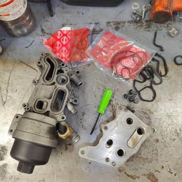 engine oil filter housing gasket replacement of a mini cooper s r56 at club spec garage