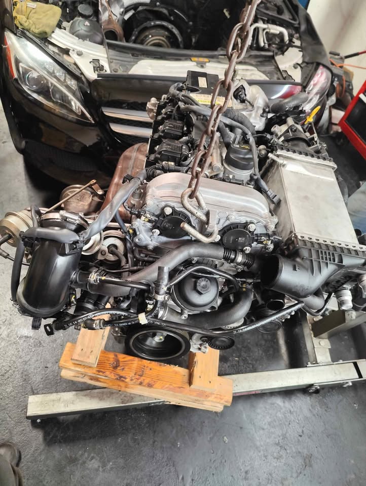 blown engine removed from a 2015 Mercedes C300 at club spec garage
