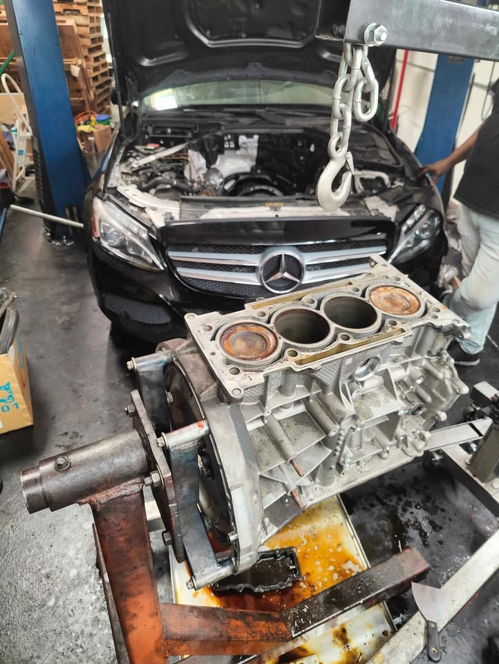 blown engine of a 2015 Mercedes C300 at club spec garage